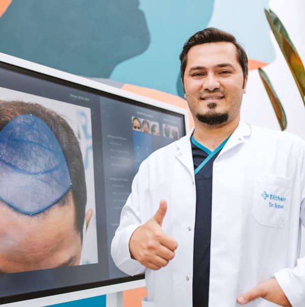 Dr. Balwi montrant la zone donneuse d'un patient