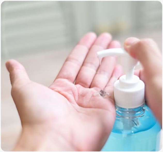 foto de um doseador de higienizador de mãos