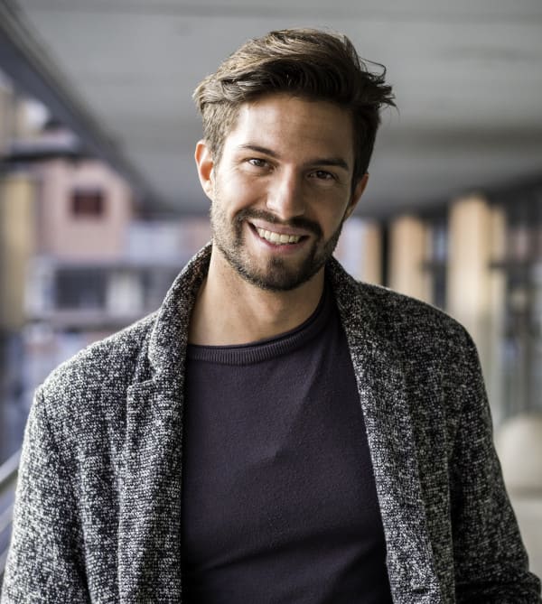 A happy man after a successful hair transplant