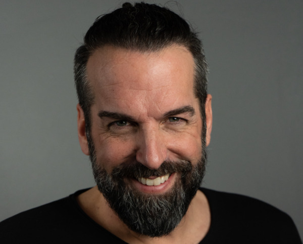 A happy patient after his hair transplant results
