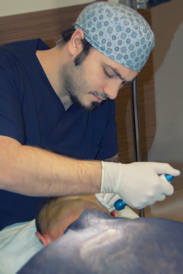 Dr Balwi applying the needle free anaesthetic