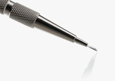 The tool used to create the channels for the percutaneous hair transplant
