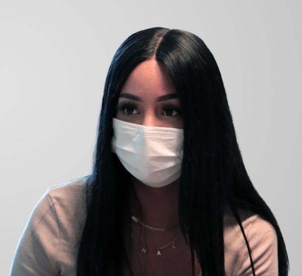 Woman with thick, long hair after a female hair transplant