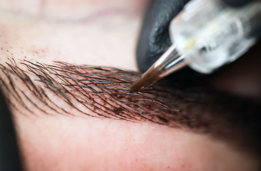 Eyebrow tattooing to create semi permanent fuller brows